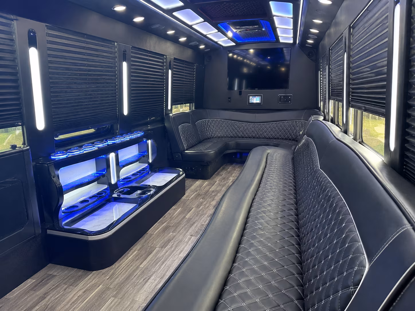 Group beside a Mercedes Sprinter limo in Amarillo